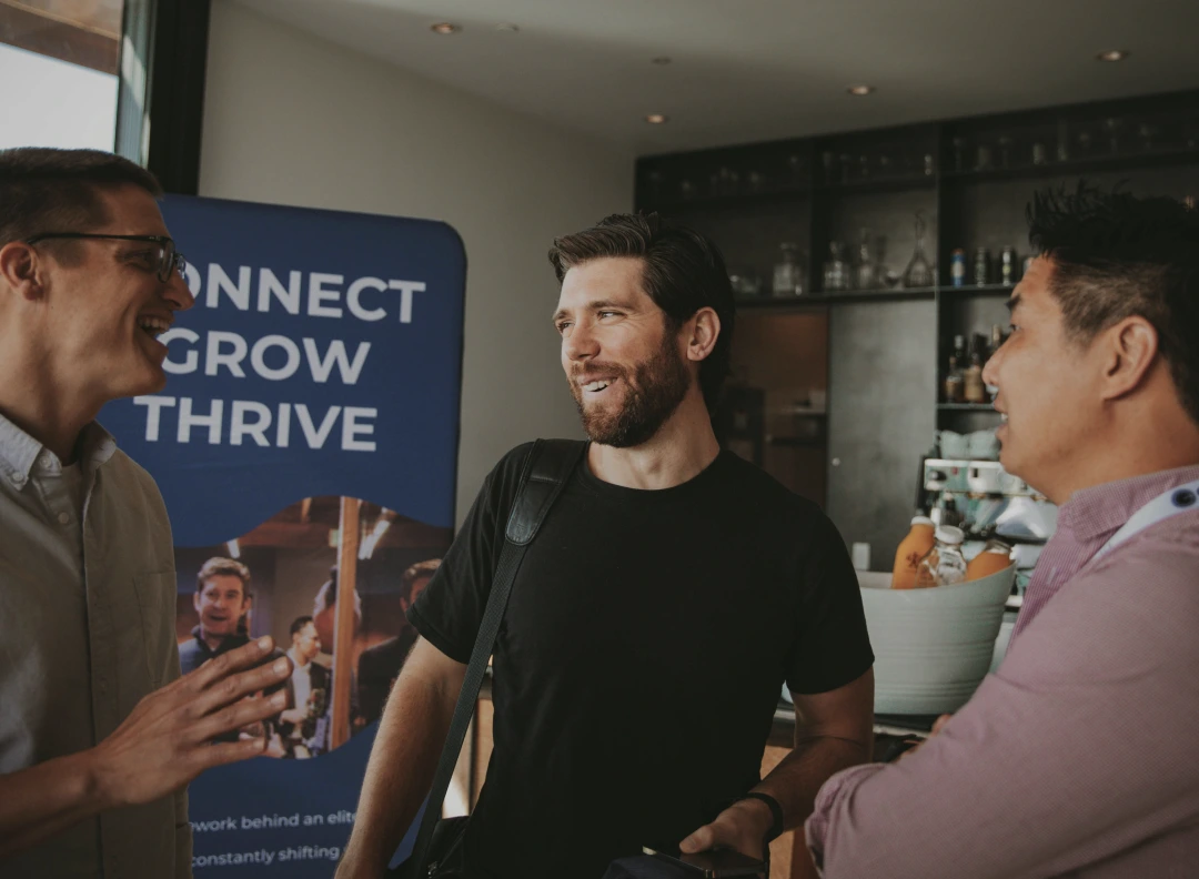 Members talking at an Identity partner event